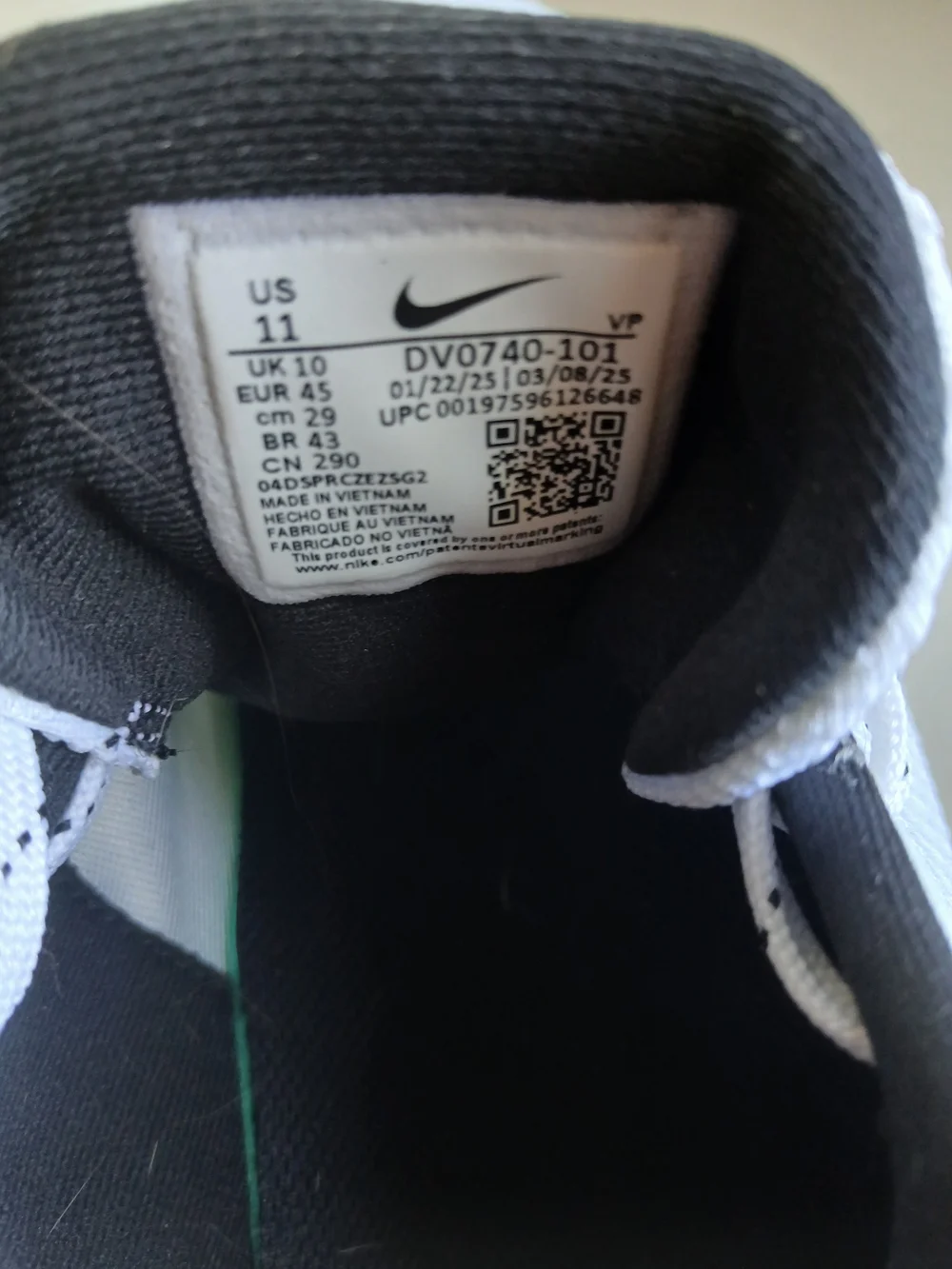 Nike Men’s White Athletic Shoes with Black Swoosh